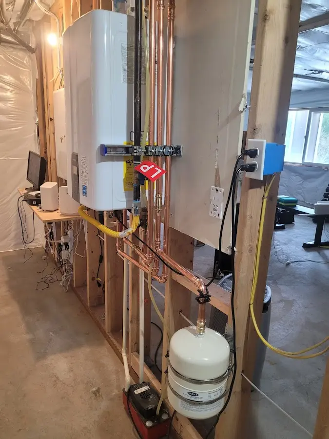 Licensed plumber repairing a kitchen sink in Flatwoods